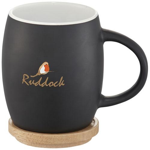 Mok van keramiek met houten deksel tevens onderzetter zwart/wit